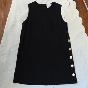 TUCKERNUCK Sleeveless Black Mini Dress with Side Gold Buttons